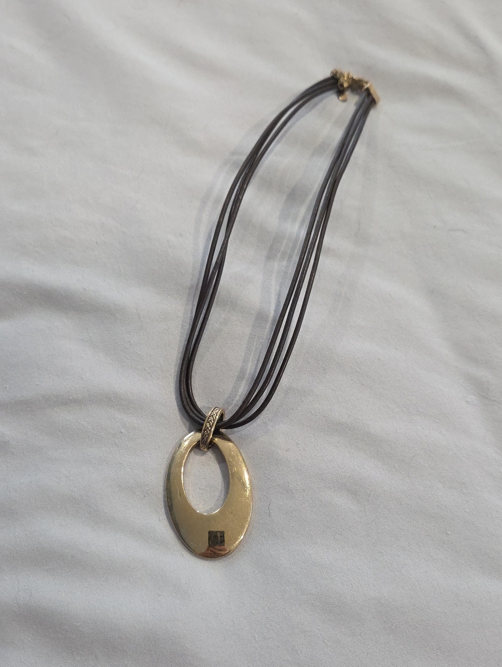 Gold Oval Pendant Necklace with Brown Multi-Strand Cord